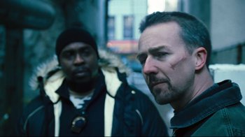 Movie still from “Pride and Glory” (2008), directed by Gavin O'Connor – Two men standing next to each other on the street; Close Up shot, Low angle