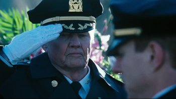 Movie still from “Pride and Glory” (2008), directed by Gavin O'Connor – An old man in uniform saluting in front of a crowd; Close Up shot, Low angle