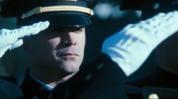 Movie still from “Pride and Glory” (2008), directed by Gavin O'Connor – A person wearing a uniform; Close Up shot, Low angle