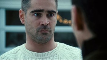 Movie still from “Pride and Glory” (2008), directed by Gavin O'Connor – A person wearing a sweater; Close Up shot, Over the shoulder angle