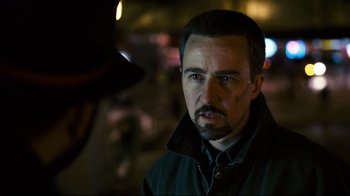 Movie still from “Pride and Glory” (2008), directed by Gavin O'Connor – A person wearing a jacket; Close Up shot, Over the shoulder angle