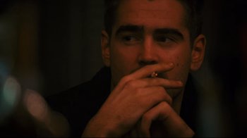Movie still from “Pride and Glory” (2008), directed by Gavin O'Connor – A person smoking a cigarette; Close Up shot, Over the shoulder angle