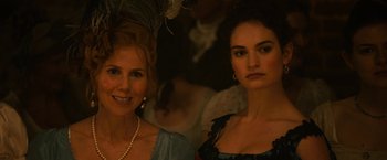 Movie still from “Pride and Prejudice and Zombies” (2016), directed by Burr Steers – Two women are standing next to each other; Close Up shot, Over the shoulder angle