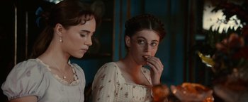 Movie still from “Pride and Prejudice and Zombies” (2016), directed by Burr Steers – Two young women are looking at each other in a room; Close Up shot, Over the shoulder angle