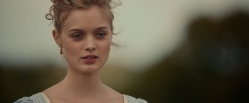 Movie still from “Pride and Prejudice and Zombies” (2016), directed by Burr Steers – A person wearing a white shirt; Close Up shot, Over the shoulder angle