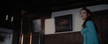 Movie still from “Pride and Prejudice and Zombies” (2016), directed by Burr Steers – A painting of a bowl of fruit hanging on the wall; Extreme Close Up shot, Low angle
