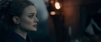 Movie still from “Pride and Prejudice and Zombies” (2016), directed by Burr Steers – A person looking at something; Close Up shot, Over the shoulder angle