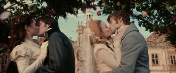 Movie still from “Pride and Prejudice and Zombies” (2016), directed by Burr Steers – A man and a woman kissing under a tree; Medium shot, Over the shoulder angle