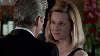 Movie still from “Primal Fear” (1996), directed by Gregory Hoblit – A man and a woman are looking at one another; Close Up shot, Over the shoulder angle