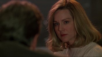 Movie still from “Primal Fear” (1996), directed by Gregory Hoblit – A person sitting in front of another person; Close Up shot, Over the shoulder angle