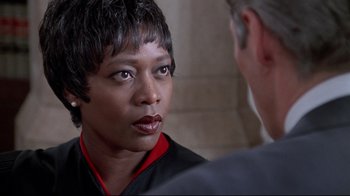 Movie still from “Primal Fear” (1996), directed by Gregory Hoblit – A man and a woman talking to each other; Close Up shot, Over the shoulder angle