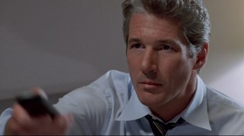 Movie still from “Primal Fear” (1996), directed by Gregory Hoblit – A person wearing a tie; Close Up shot, Low angle