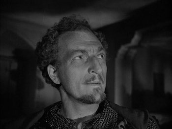 Movie still from “Prince of Foxes” (1949), directed by Henry King – Black and white photograph of a man with a beard; Close Up shot, Low angle