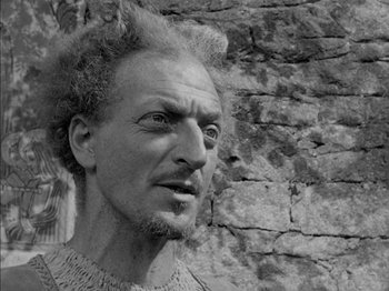 Movie still from “Prince of Foxes” (1949), directed by Henry King – An old man with a beard is looking at the camera; Close Up shot, Low angle