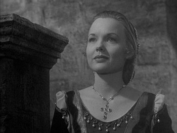 Movie still from “Prince of Foxes” (1949), directed by Henry King – A black - and - white photo of a woman in a medieval dress; Close Up shot, Low angle