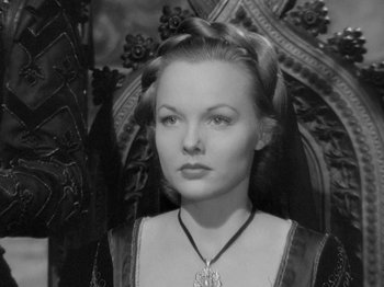 Movie still from “Prince of Foxes” (1949), directed by Henry King – A black - and - white photo of a woman in medieval dress; Close Up shot, High angle