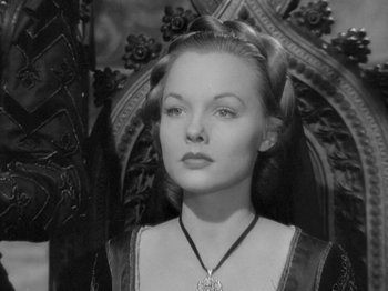 Movie still from “Prince of Foxes” (1949), directed by Henry King – A black - and - white photo of a woman in medieval dress; Close Up shot, Low angle