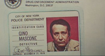 Movie still from “Prince of the City” (1981), directed by Sidney Lumet – A police identification card; Extreme Close Up shot, Low angle