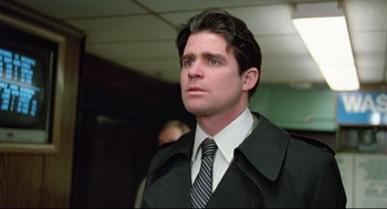 Movie still from “Prince of the City” (1981), directed by Sidney Lumet – A man in a black jacket and a tie; Close Up shot, Low angle