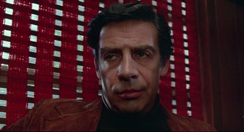 Movie still from “Prince of the City” (1981), directed by Sidney Lumet – A person wearing a jacket; Close Up shot, Low angle