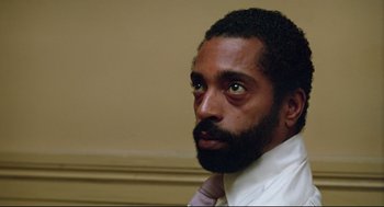 Movie still from “Prince of the City” (1981), directed by Sidney Lumet – A person wearing a shirt and tie; Close Up shot, Low angle