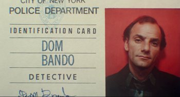Movie still from “Prince of the City” (1981), directed by Sidney Lumet – A person's identification card; Close Up shot, Overhead angle