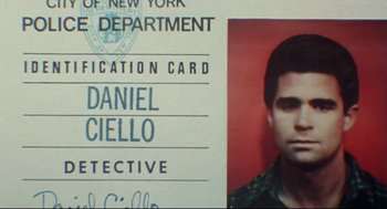 Movie still from “Prince of the City” (1981), directed by Sidney Lumet – A new york police department identification card; Close Up shot, Overhead angle