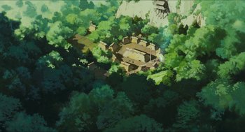 Movie still from “Princess Mononoke” (1997), directed by Hayao Miyazaki – An aerial view of an ancient building surrounded by trees; Extreme Wide shot, High angle
