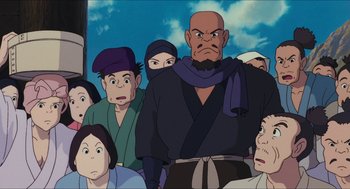 Movie still from “Princess Mononoke” (1997), directed by Hayao Miyazaki – A group of people standing in front of each other; Medium shot, Low angle