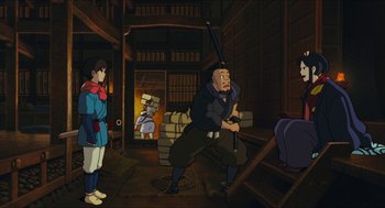 Movie still from “Princess Mononoke” (1997), directed by Hayao Miyazaki – An animated scene of a man and a woman in a room; Wide shot, Low angle