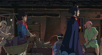 Movie still from “Princess Mononoke” (1997), directed by Hayao Miyazaki – An animated scene of a man and a woman in a room; Medium shot, Over the shoulder angle