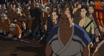 Movie still from “Princess Mononoke” (1997), directed by Hayao Miyazaki – A bunch of people that are standing in the dirt; Medium shot, High angle