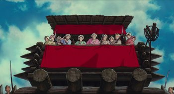 Movie still from “Princess Mononoke” (1997), directed by Hayao Miyazaki – A group of people sitting on a platform; Wide shot, Low angle