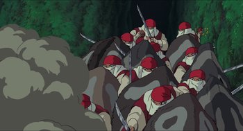 Movie still from “Princess Mononoke” (1997), directed by Hayao Miyazaki – A bunch of men are fighting in a field; Wide shot, High angle
