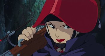 Movie still from “Princess Mononoke” (1997), directed by Hayao Miyazaki – A person with a red hat on; Close Up shot, Low angle