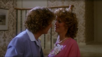 Movie still from “Prom Night” (1980), directed by Paul Lynch – Two people standing next to each other in front of a railing; Close Up shot, Over the shoulder angle