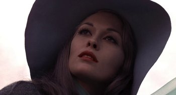 Movie still from “Puzzle of a Downfall Child” (1970), directed by Jerry Schatzberg – A person with long brown hair; Close Up shot, High angle
