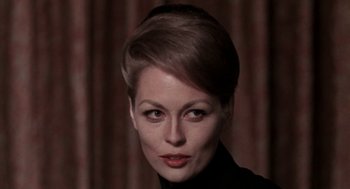 Movie still from “Puzzle of a Downfall Child” (1970), directed by Jerry Schatzberg – A person with short hair; Close Up shot, Low angle