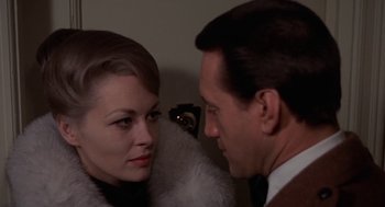 Movie still from “Puzzle of a Downfall Child” (1970), directed by Jerry Schatzberg – A man and a woman looking at one another; Close Up shot, Over the shoulder angle