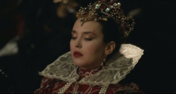 Movie still from “Queen Margot” (1994), directed by Patrice Chéreau – A person wearing a crown; Close Up shot, Over the shoulder angle