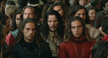 Movie still from “Queen Margot” (1994), directed by Patrice Chéreau – A group of men with long hair and dreadlocks; Close Up shot, High angle