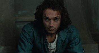 Movie still from “Queen Margot” (1994), directed by Patrice Chéreau – A person with long dark hair; Close Up shot, Low angle