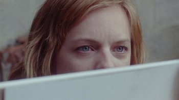 Movie still from “Queen of Earth” (2015), directed by Alex Ross Perry – A woman's eyes looking at a computer screen; Extreme Close Up shot, Over the shoulder angle