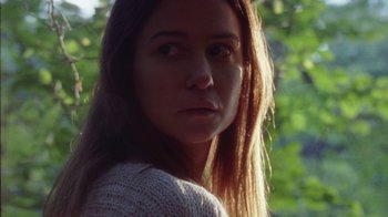 Movie still from “Queen of Earth” (2015), directed by Alex Ross Perry – A person with long hair; Close Up shot, Low angle