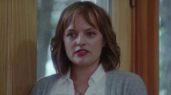 Movie still from “Queen of Earth” (2015), directed by Alex Ross Perry – A person with short hair; Close Up shot, Over the shoulder angle