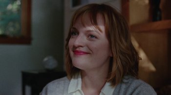 Movie still from “Queen of Earth” (2015), directed by Alex Ross Perry – A person with short brown hair; Close Up shot, Over the shoulder angle