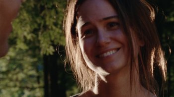 Movie still from “Queen of Earth” (2015), directed by Alex Ross Perry – A woman's face in the sunlight; Close Up shot, Over the shoulder angle