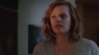 Movie still from “Queen of Earth” (2015), directed by Alex Ross Perry – A person wearing a necklace; Close Up shot, Over the shoulder angle