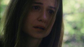 Movie still from “Queen of Earth” (2015), directed by Alex Ross Perry – A person with long hair; Close Up shot, High angle