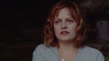 Movie still from “Queen of Earth” (2015), directed by Alex Ross Perry – A person with short hair; Close Up shot, Over the shoulder angle